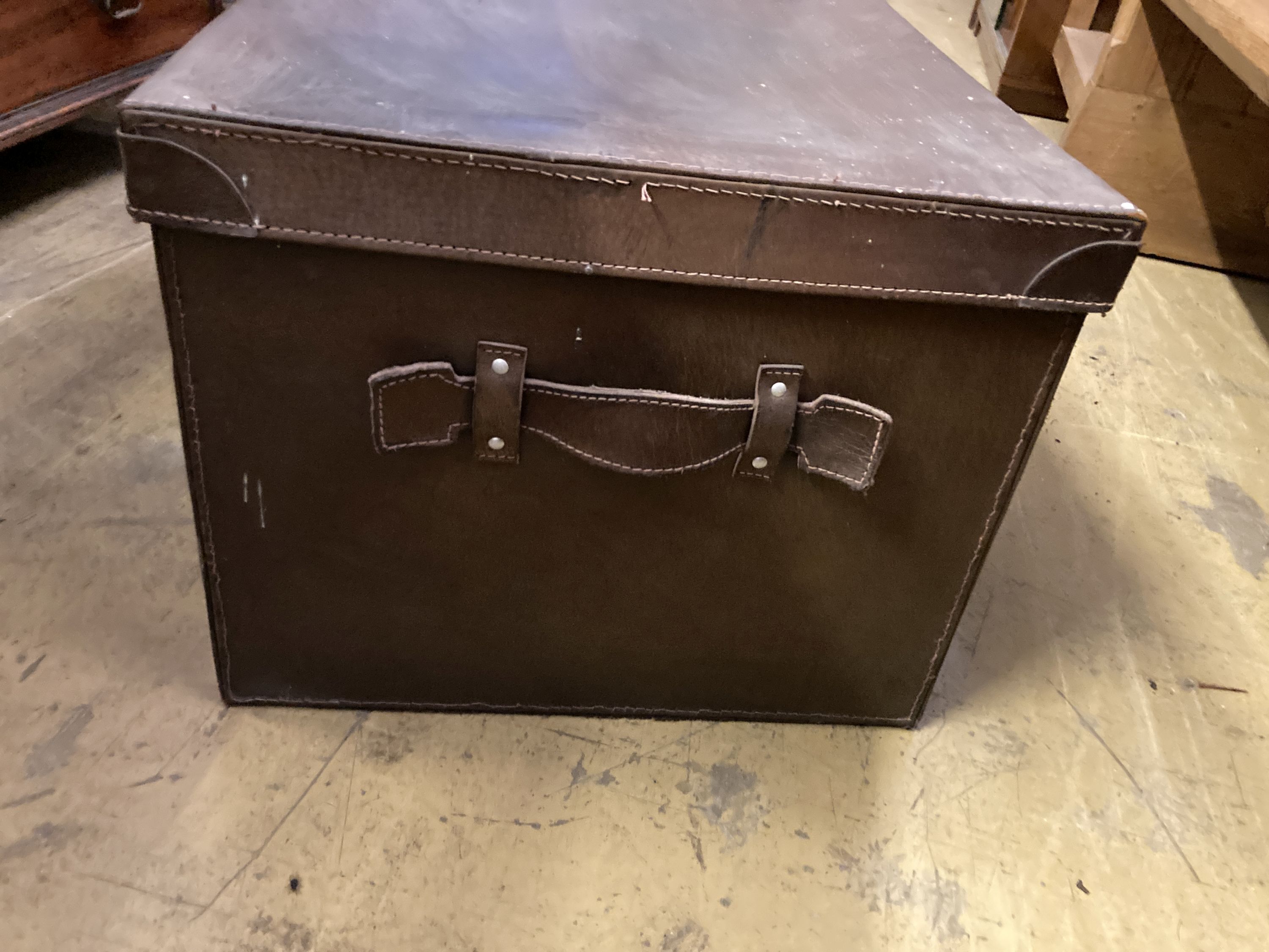 A rectangular brown leather trunk, length 70cm, depth 50cm, height 40cm